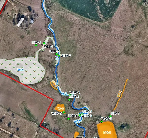 Engineer's site analysis: aerial survey with wetlands, drainage, and boundary lines marked